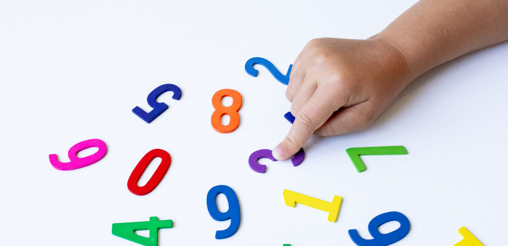 Play and Learning with Numbers and Language